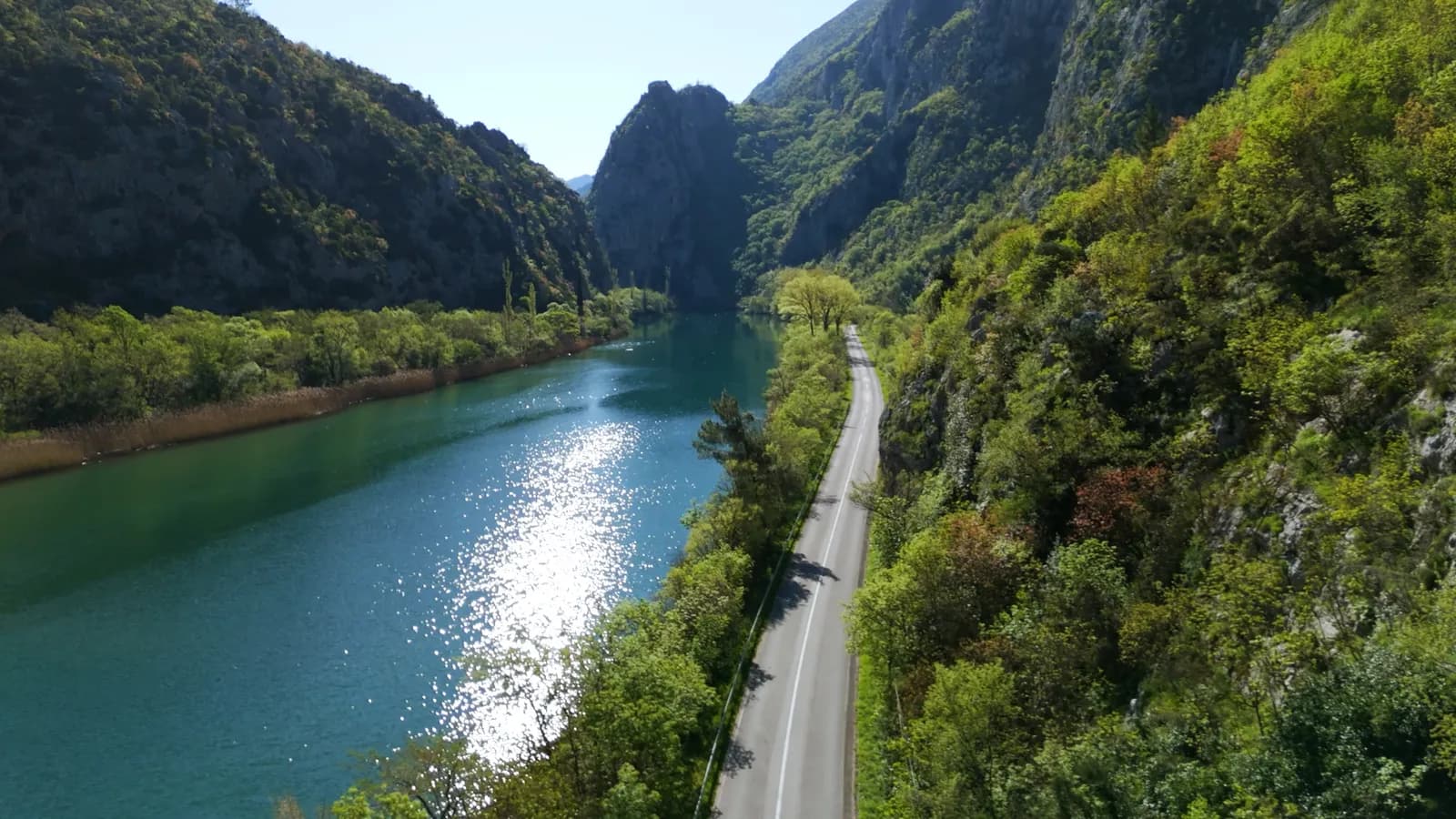 Official Omiš Half Marathon 2026 event visual with runners above the Omiš waterfront and Cetina landscape