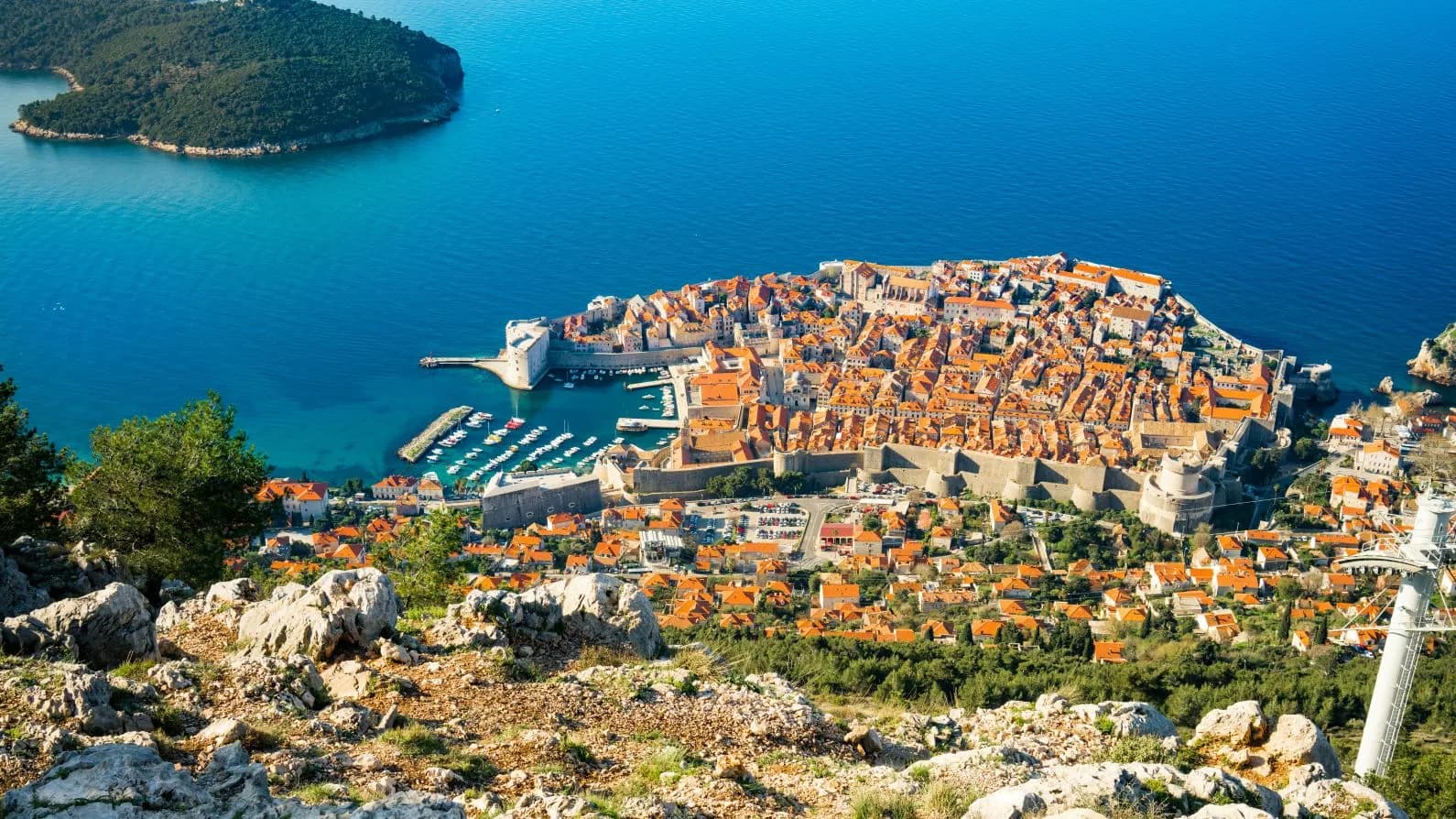 Dubrovnik view used by Dubrovnik Airport on its official Dubrovnik Pass page for a guide about staying near the airport or in the city